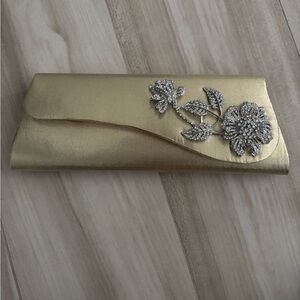 Elegant Gold Clutch with Silver Floral Design